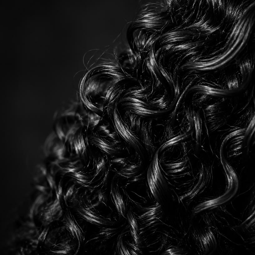 Macro studio photograph of type 3A hair texture
