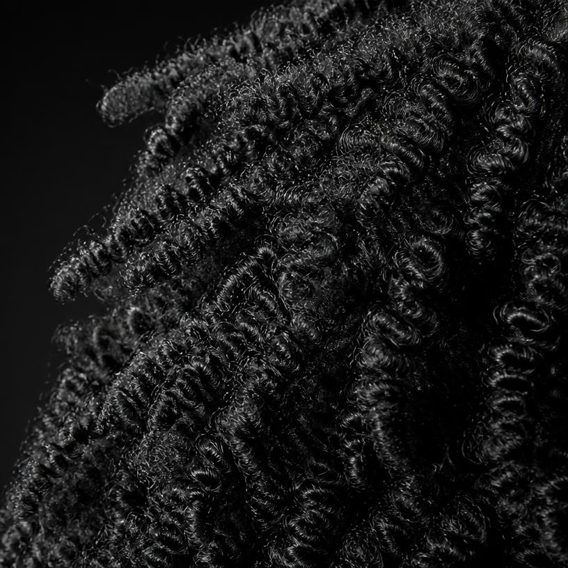 Macro studio photograph of type 4A hair texture