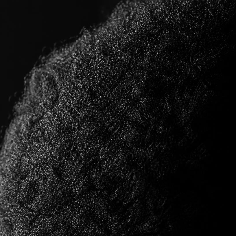 Macro studio photograph of type 4C hair texture